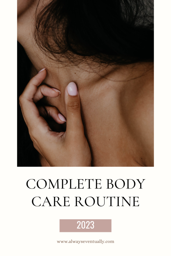 Text reads: Complete Body Care Routine 2023, and features an image of a dark haired woman with glowing skin and beige painted nails.